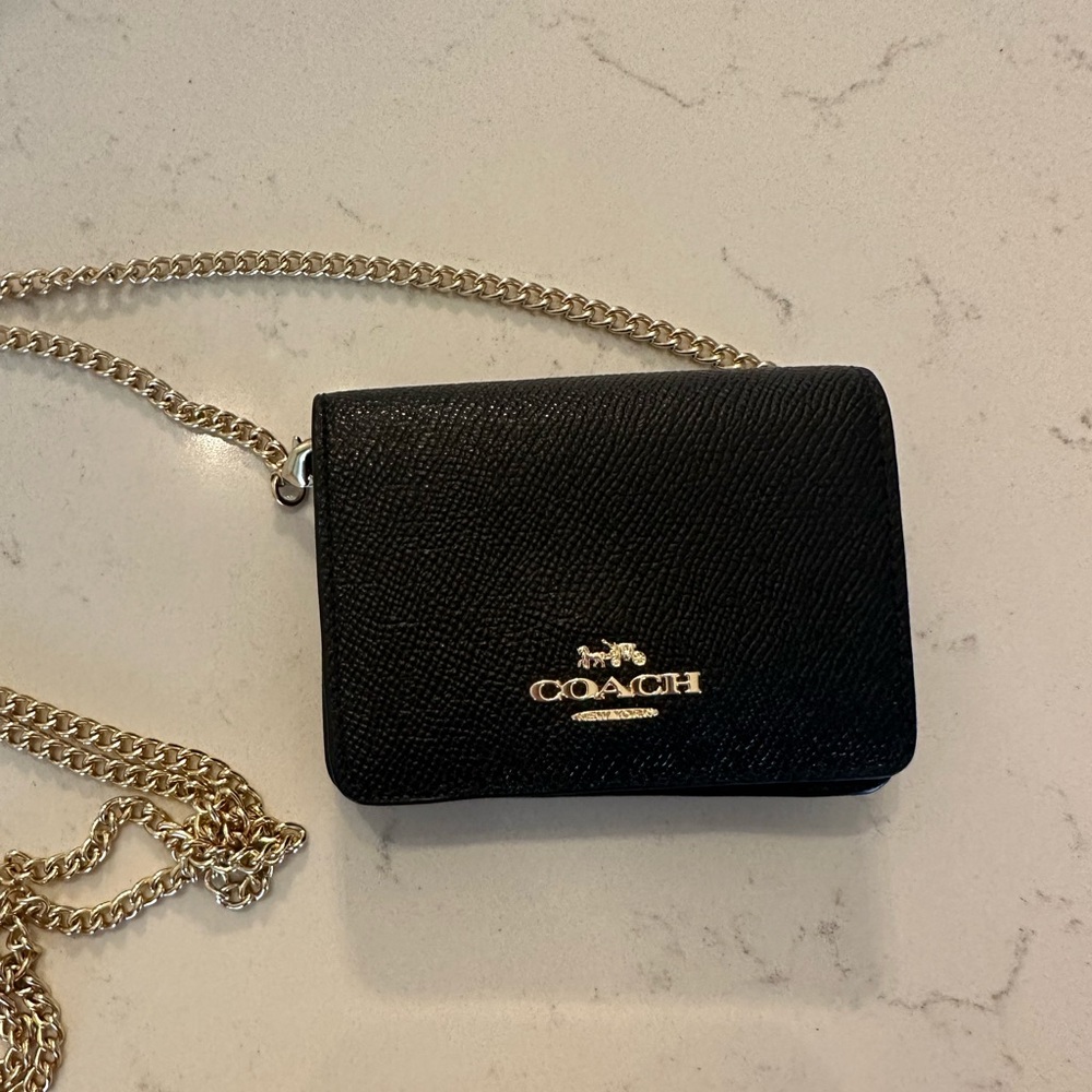 Tiny Coach crossbody wallet